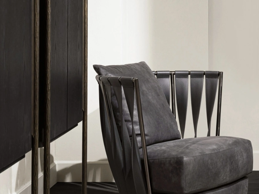 Poltroncina in pelle e tessuto Twist di Cantori