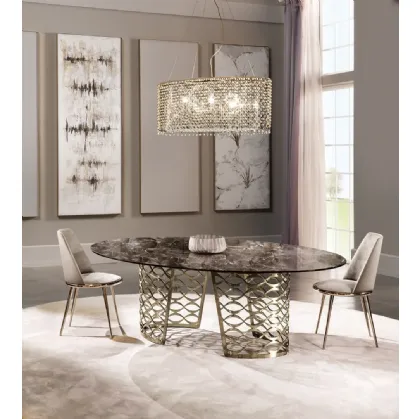 Tavolo in marmo con base in metallo lavorato Isidoro di Cantori